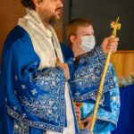 Celebrating Hierarchal Divine Liturgy during the Covid-19 pandemic of 2020 and practicing social distancing with Bishop Maxim, Fr. Dane Popovich and Deacon Dragan Stojanovich during the 12th Sunday after Pentecost and in honor of the Feast of the Dormition of the Holy Mother of God (Aug. 28). Dormition of the Theotokos Serbian Orthodox Church, Fair Oaks, Calif.